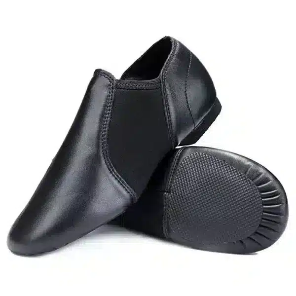 Dancer wearing black neoprene jazz shoes during performance