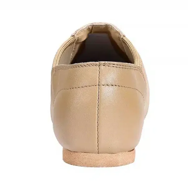 Dancer wearing brown neoprene jazz shoes in studio