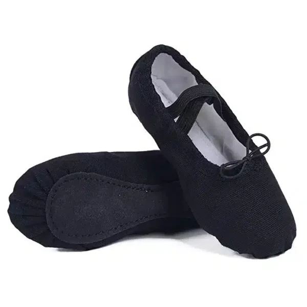 Black canvas ballet shoe with suede sole and elastic strap